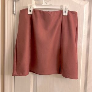 Pink soft and stretchy skirt, size medium. Very flattering!